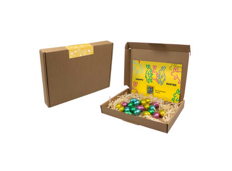 Schachtel mit Ostereiern im Nest