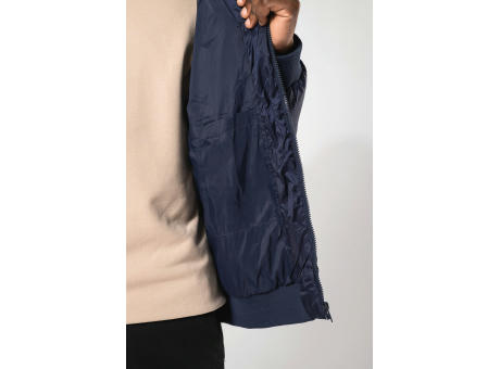 Chaqueta ripstop reciclada con capucha unisex