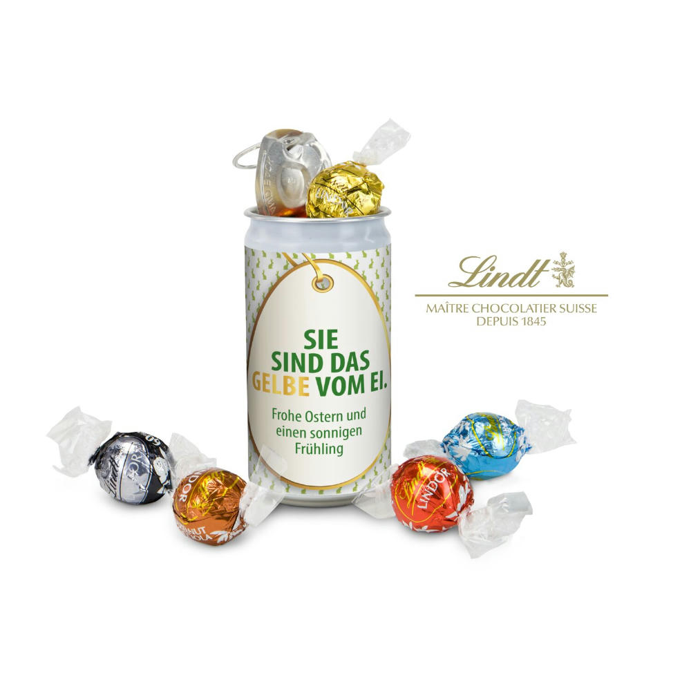 Geschenkartikel / Präsentartikel: Lindt-Geheimnis Ostern, das Nest in der Dose - Etikett Sie sind das Gelbe vom Ei