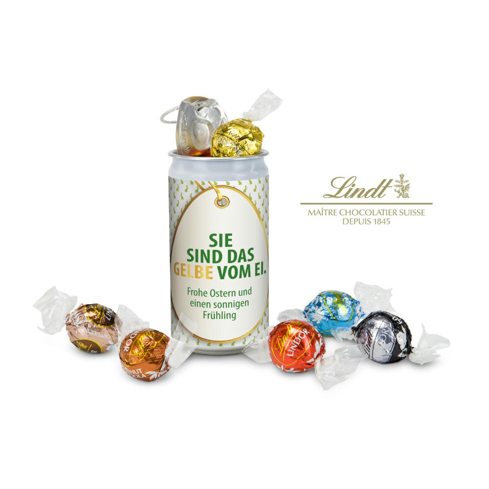 Geschenkartikel / Präsentartikel: Lindt-Geheimnis Ostern, das Nest in der Dose - Etikett Sie sind das Gelbe vom Ei