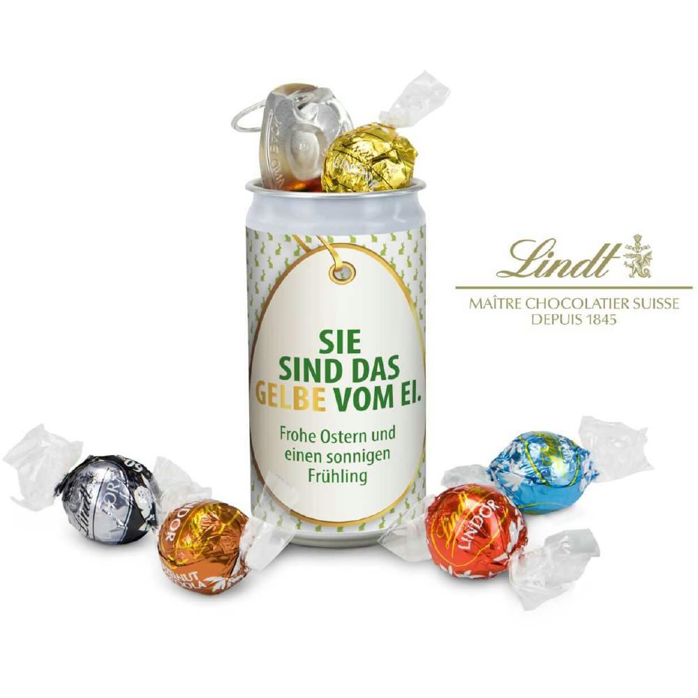 Geschenkartikel / Präsentartikel: Lindt-Geheimnis Ostern, das Nest in der Dose - Etikett Sie sind das Gelbe vom Ei